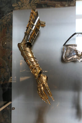 a gold articulated glove