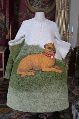 beaded dress with dog on mannequin